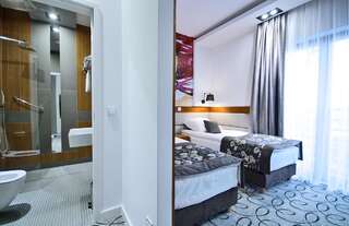 Отель Hotel Kozak Хелм Улучшенный двухместный номер с 2 отдельными кроватями-2